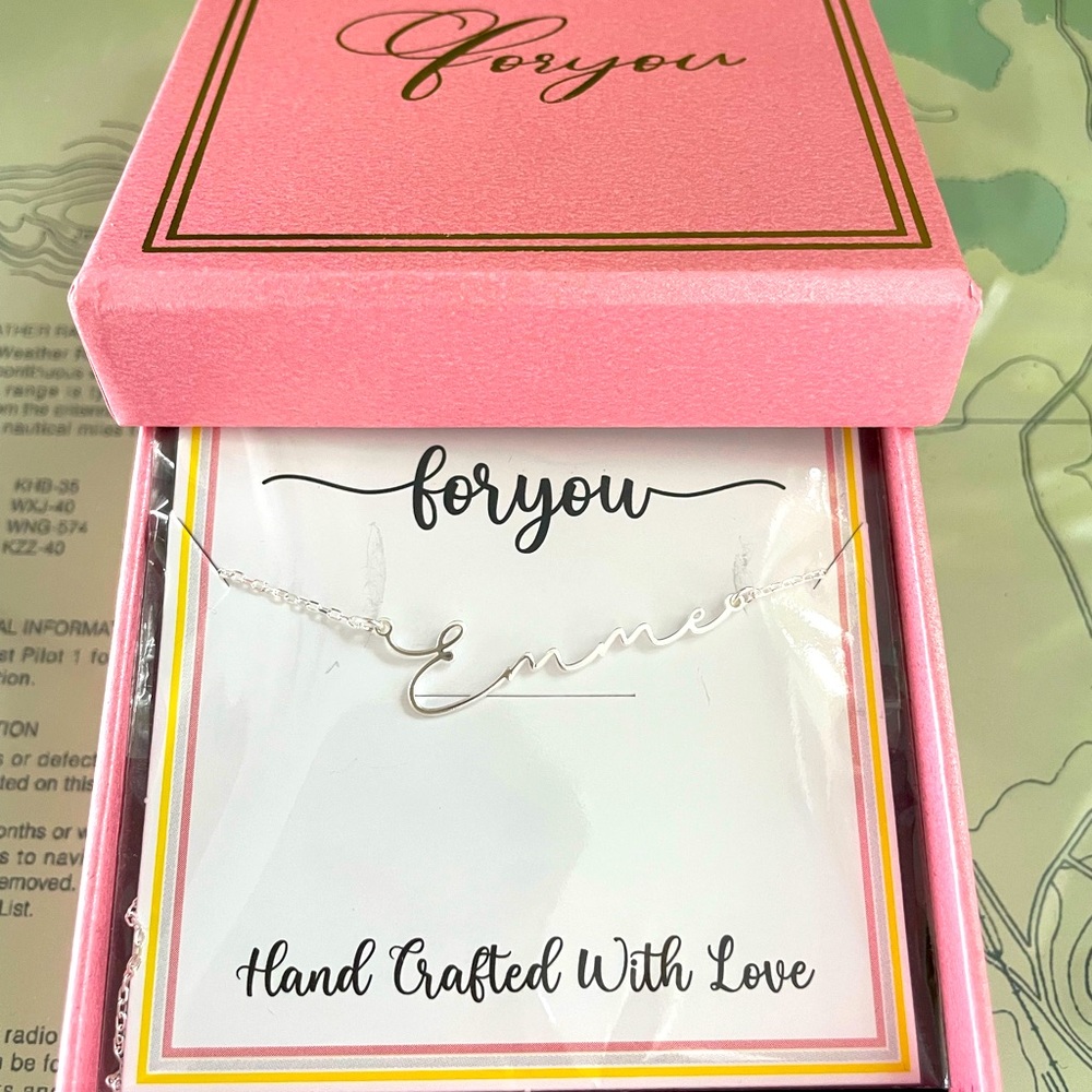 Sterling silver personalized necklace with the name Emme. New in original box